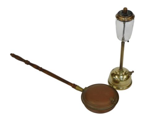 A mid century brass tilley lamp, with an impressed glass shade, on a reeded column, on circular base, 62cm high, together wit