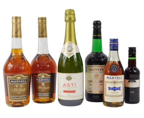 A group of alcohol, comprising three bottles of Martell cognac, bottle of Dow's 2000 port, 20cl, Harvey's Bristol Cream sherr