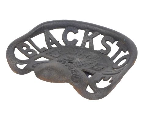 A Blackstone Stamford black painted cast iron tractor seat, 37cm wide. 