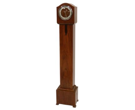 An Art Deco walnut cased grandmother clock, the circular dial with silvered chapter ring bearing Arabic numerals, eight day m