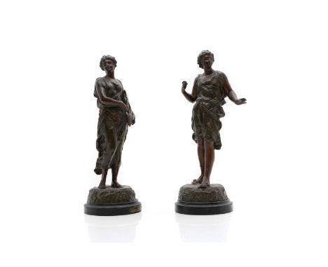 A pair of spelter figures, one titled 'Music', 25cm and 35.5cm high (2)Condition ReportLoose bases, with wear.