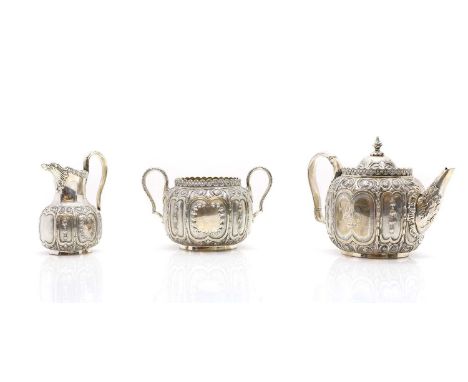 A Victorian three piece silver tea service by Roberts &amp; Slater, Sheffield 1858, with diamond registration mark, comprisin