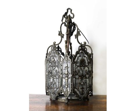 A gilt-brass hanging lantern the canted panelled sides with relief decorated mounts, 28cm wide65cm high (2)Condition ReportPa