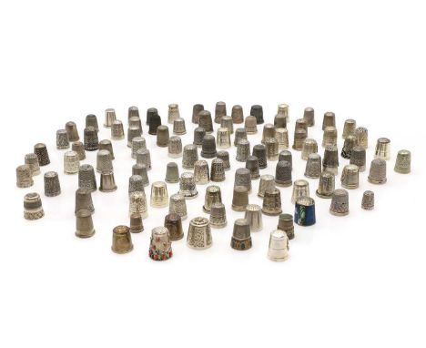 A large collection of silver thimbles comprising 100 examples, with various engine turned, engraved, cabochon inset and ename