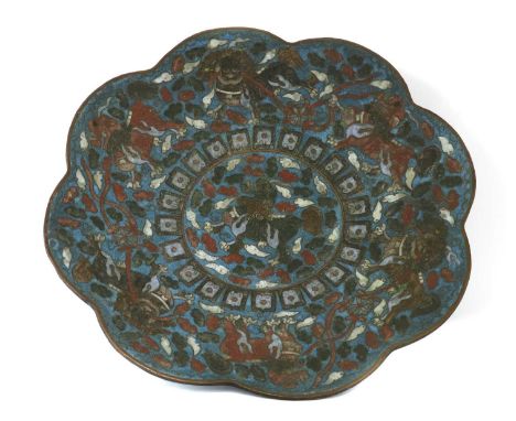 A Chinese cloisonné dish, Republic period (1912-1949), of lobed form on a splayed stem, enamelled with Buddhist lions and pup