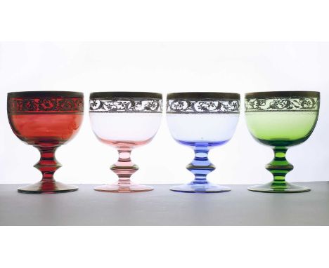 A set of four coloured Murano glass goblets, 20th century, by Griffe to include, a green glass, rose glass, ruby glass and bl