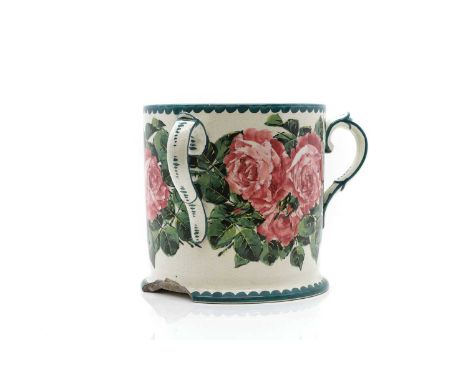 A large porcelain Wemyss tyg, of cylindrical form with three loop handles, painted with roses, and with a teal scalloped bord