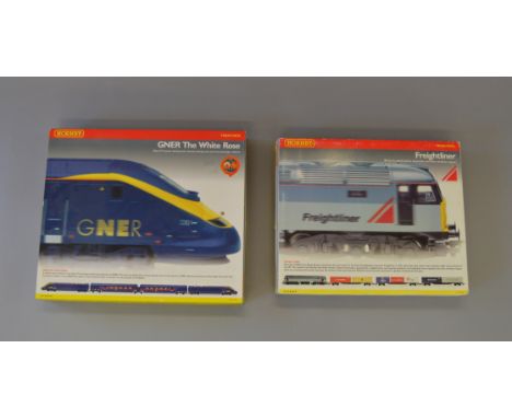 OO Gauge. Hornby. 2 x train packs. R.2080 "Freightliner" BR Co-Co diesel with 3 container wagons & R.2197 GNER "The White Ros