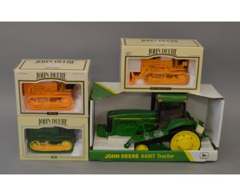 Four ERTL 1:16 scale John Deere models: #5067DA 420 Collectors Edition; #5771 430 Crawler Industrial Model; #5181 8400T Tract