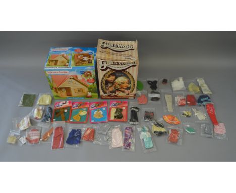 Mixed lot of girls toys: boxed Flair Sylvanian Families Copper Beech Cottage; boxed Palitoy Girl's World with instructions an