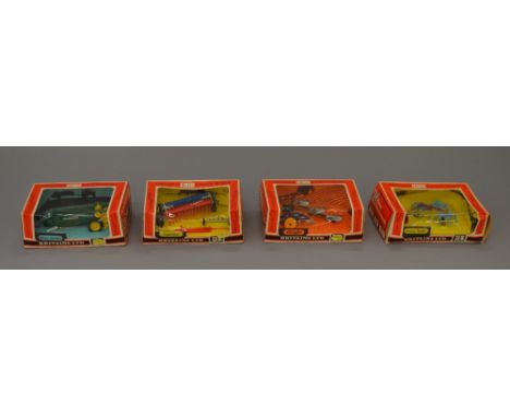 Four Britains Farm Implements, 1:32 scale: 9546 Ploughs; 9541 Rotary Tedder; 9539 Seed Drill; 9540 Manure Spreader. Overall a