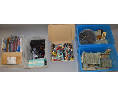 OO Gauge. Quantity of model railway accessories & controllers. Includes card buildings, unmade kits & a quantity of scale veh