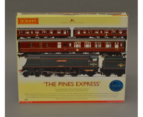 OO Gauge Hornby. R.2436 "Pines Express" train pack. BR West Country "Combe Martin" with 3 coaches. VG/E boxed.