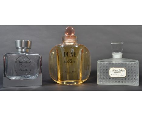 A group of three vintage 20th century advertising point of sale shop display perfume bottles. Dune Christian Dior 1991 , Miss