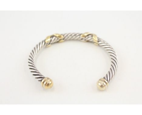 A silver Links of London bangle with gold detailing (34g)