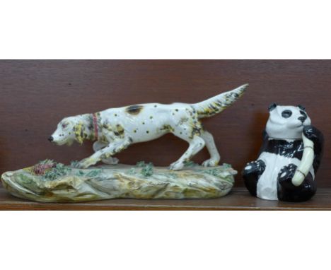 A Beswick Panda teapot and a Staffordshire model of a gun dog (2) 