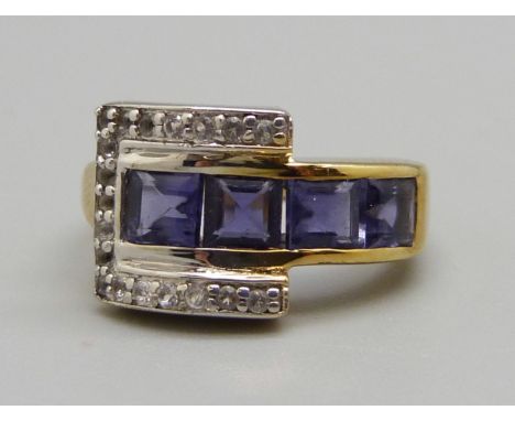 A silver gilt, iolite set buckle ring, M 