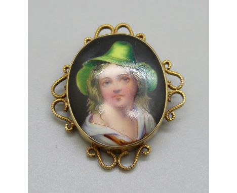 A 9ct gold mounted portrait brooch, 9.2g, portrait 24mm wide 