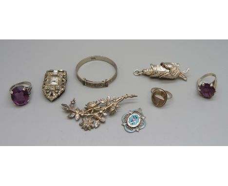A silver ring depicting a cruise ship, an Art Deco collar clip with watch, an enamel pendant, a/f, a small silver bangle, a s