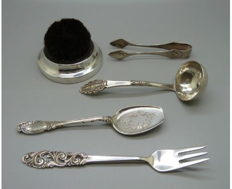 A silver mounted pen wipe, an 830 silver Norwegian Mylius fork, a small ladle, etc. 