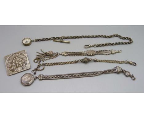 A locket on an Albertina chain, two other Albertina chains, an Albert chain with compass and a brooch 