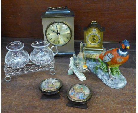 A collection of items including a Goebel bird, a Metamec clock, another clock with onyx base, etc. 