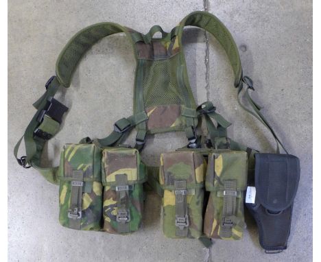 An Army combat harness with gun holster 