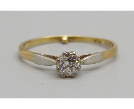 An 18ct gold, platinum and diamond solitaire ring, approximately 0.25ct diamond weight, 1.5g, M 