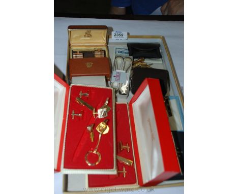 A quantity of gents tie pins, sets of cufflinks and armbands.