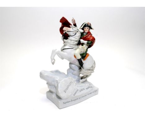 An East German (DDR) figure of Napoleon mounted on the rearing Marengo, mid-20th century, on a titled base 'Napoleon-Bonapart