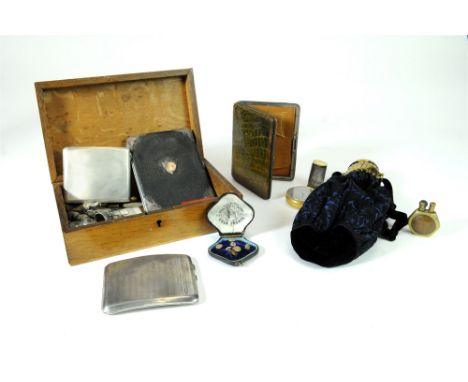 A silver mounted wallet, together with two silver cigarettes cases, an engine turned snuff box, a 9ct gold signet ring, a 194