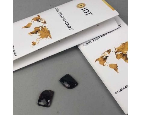 **GROUP OF CERTIFICATED UNMOUNTED GEMS, including an oval mixed cut peridot weighing approximately 2.19 carats, with accompan