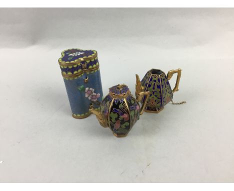 MINIATURE CLOISONNE TEA POT WITH COVER, 4.5cm high, along with another, a cloisonne jar and cover and nine ceramic posies