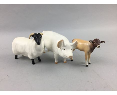 BESWICK FIGURE OF A PIG, along with a Beswick figure of a ram and a deer, a ceramic toastrack, Royal Winton 'Grimwades' small