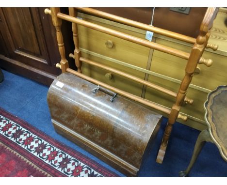 VINTAGE SINGER PORTABLE SEWING MACHINE, cased in oak, along with a shaped oval occasional table, a modern pine towel rail and