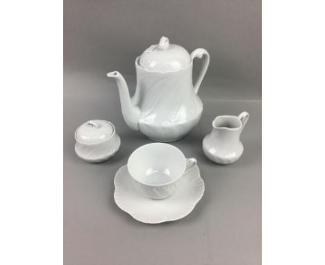 ROYAL LIMOGES PART TEA SERVICE, including tea pot, cream and sugar, along with Royal Limoges dining plates