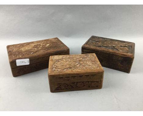 THREE CARVED WOOD TRINKET BOXES, along with two boxes of dominoes and various other boxes