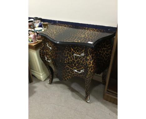CONTINENTAL STYLE BOMBE CHEST, with two drawers, in simulated leopard print finish, 86cm wide