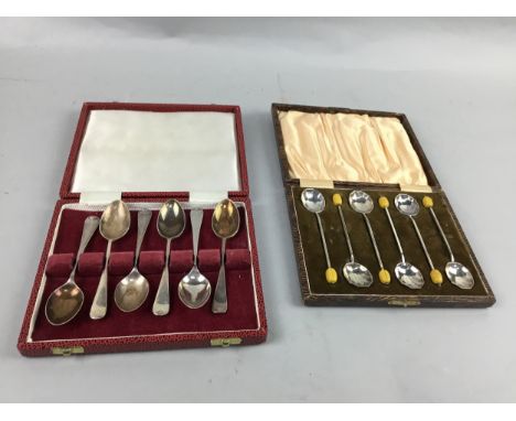 SET OF SIX CASED SILVER SPOONS, along with another cased silver spoon and cased silver plated flatware