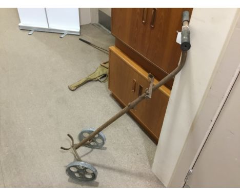 VINTAGE METAL GOLF TROLLEY, along with two hickory shafted golf clubs and a Dunlop racket case with racket