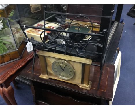 CAST METAL MAGAZINE RACK, along with a Metamec mantel clock, an Eastern treen bowl and a glass vase