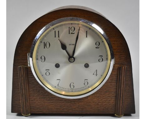 A Mid 20th Century Oak Cased Mantel Clock by Dupontic, 26cm wide 