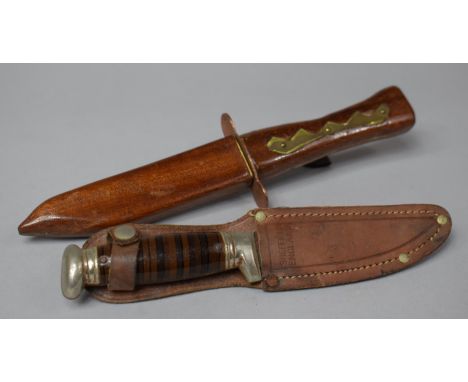 A Bowie Style Hunting Knife in Leather Scabbard Together with a Brass Mounted Wooden Handle Desk Knife in Wooden Scabbard 