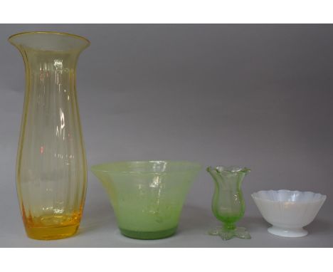 A Small Green Glass Vase, Two Glass Bowls and a Tall Amber Glass Vase 