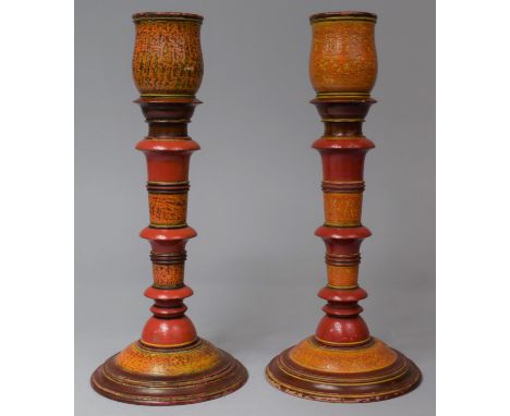 A Pair of Turned Wooden Candle Sticks with Coloured Enamel Decoration, Each 30cm high 