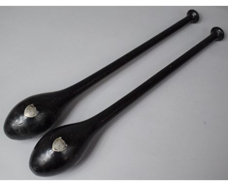 A Pair of Victorian White Metal Mounted Ebonised Exercise Clubs Awarded to "Miss G Hunter, First Prize (Gym) Midsummer 1899",