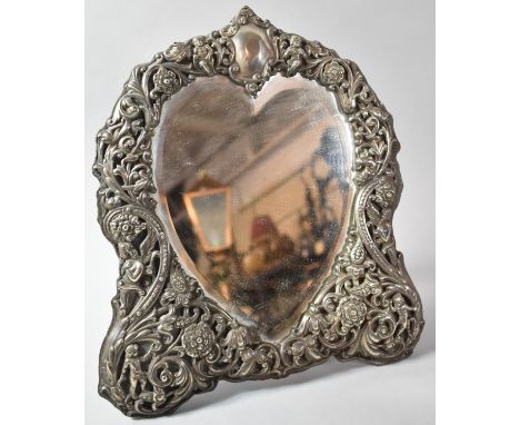 A Good Quality Victorian Silver Mounted Heart Shaped Easel Backed Dressing Table Mirror Decorated in Relief with Cherubs and 