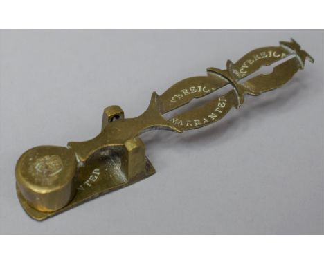 A Late 19th Century Brass Full and Half Sovereign Scale, 9cm long 