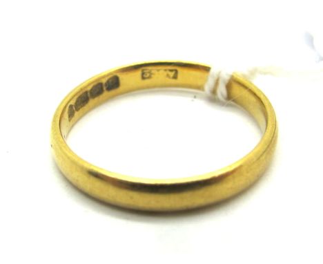A 22ct Gold Wedding Band, London 1951 (finger size K) (2.4grams). 