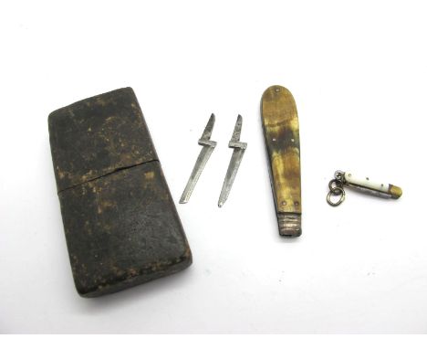 A Penknife with Interchangeable Blades, polished horn scales, nickel plated bolster and brass linings, in original box, 7.5cm